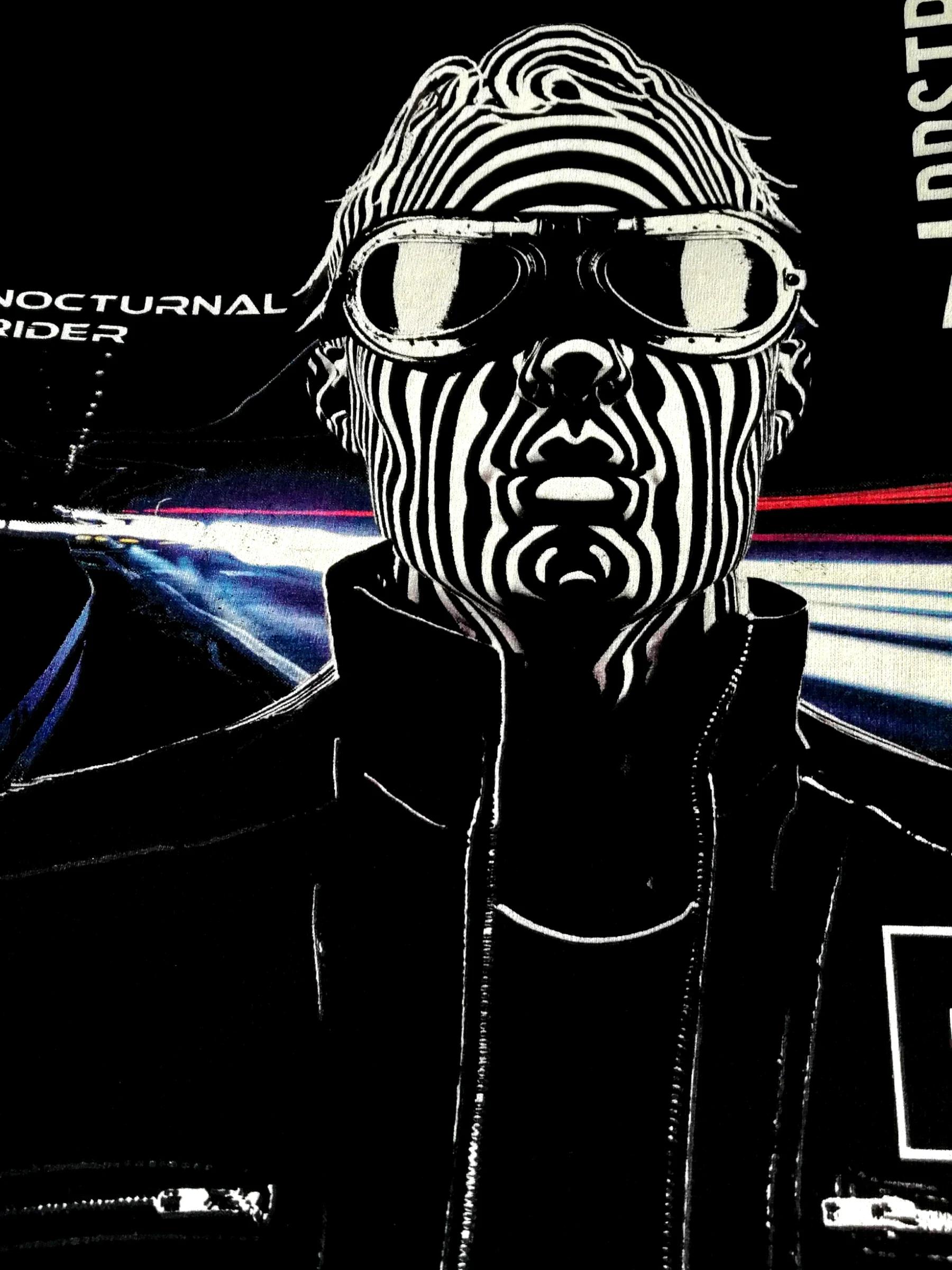 Nocturnal Rider — monochrome op-art biker print on black t-shirt, hybrid digital and discharge printing by Macrofast